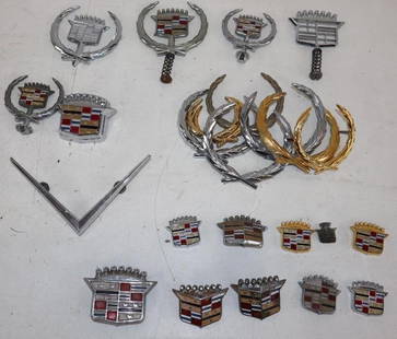 Group of 25 Cadillac Fender Emblems and Hood Ornaments: largest 5.5" x 3.5"