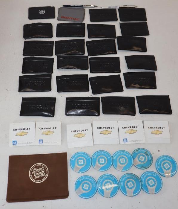 Group of 46 GM, Lincoln, and Chevrolet Key Pouches, Golf Tees, and Pin Back Badges: largest 3.75" x 2.5"