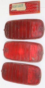 Group of 4 Embossed Chevrolet and Kaiser Taillight Lenses: largest 6" x 2.75", Chevrolet lenses are plastic