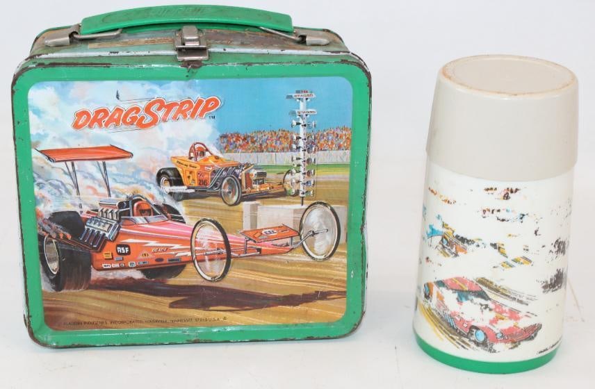 Drag Strip Embossed Metal Aladdin Lunchbox with Thermos: has wear around edges, with heavy denting. Lunchbox 8" x 7.5" x 3.75", thermos 3.25" x 3.25" x 6.75", lid does not appear to be original.
