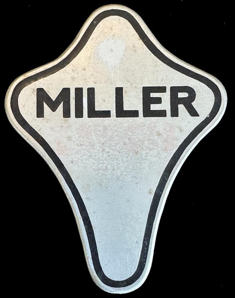 Miller Emblem: Miller emblem from the Shears Collection. This emblem was also originally part of the John Webster collection, which was purchased by the Shears. It is not pictured on www.americanautoemblems.com as i