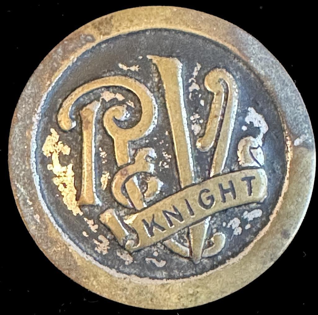 1920-1923 R&V Knight Hub Emblem: c1920-1923 R&V Knight hub emblem from the Shears Collection. It is pictured on www.americanautoemblems.com. It measures approximately 1.8" in diameter.