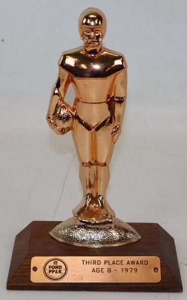 1979 Age 8 Third Place Football Trophy Sponsored by Ford: 5.25" x 3" x 8.5"