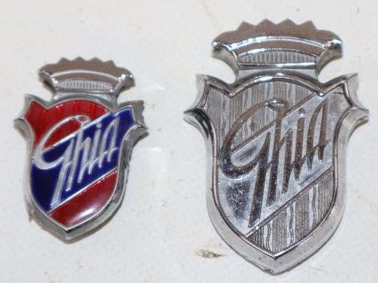 Group of 2 1970's Ford Ghia Emblems: largest 1.5" x 2.25"