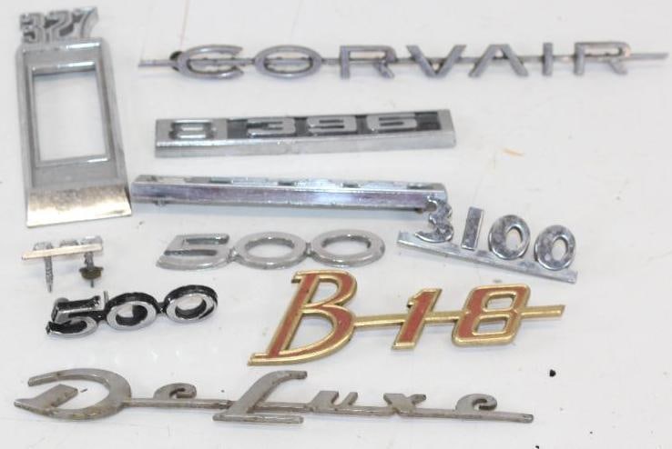 Group of 9 Chevrolet, Volvo, and Ford Fender Emblems: Largest is 11" x 1"