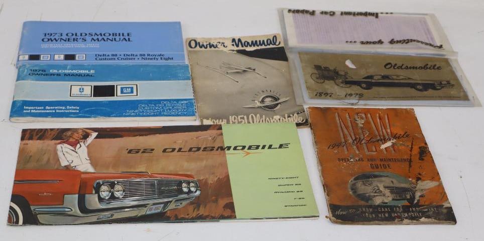 Group of 6 1940's-70's Oldsmobile Owners Manuals and Dealership Brochures: Largest is 12.5" x 6.5"