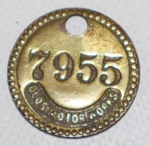 Olds Motor Works Embossed Brass Tag: 1.25" x 1.25"