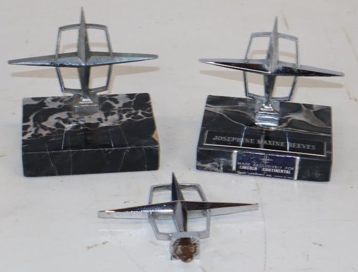 Group of 3 Lincoln Continental Hood Ornaments: largest 4" x 3" x 4.5", 2 are mounted on marble bases