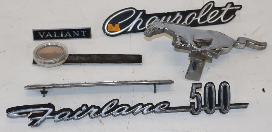 Group of 6 Ford, Chevy, and International Emblems and Hood Ornament: largest 12" x 2"