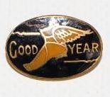 Cloisonne Goodyear Winged Foot Pin Back Badge (Gold): .75" x .5"