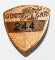 Cloisonne Goodyear Akron Employee Shield Shaped Pin Back Badge: .75" x .75"