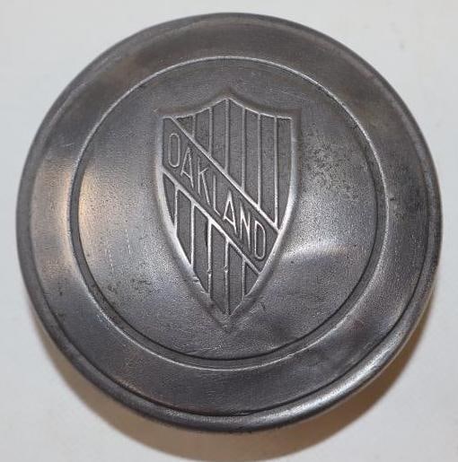 Oakland Embossed Aluminum Threaded Automobile Hubcap (1 of 2)
