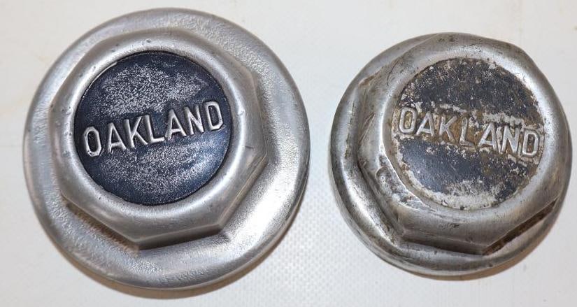 Group of 2 Oakland Embossed Aluminum Threaded Automobile Hubcaps (1 of 2)