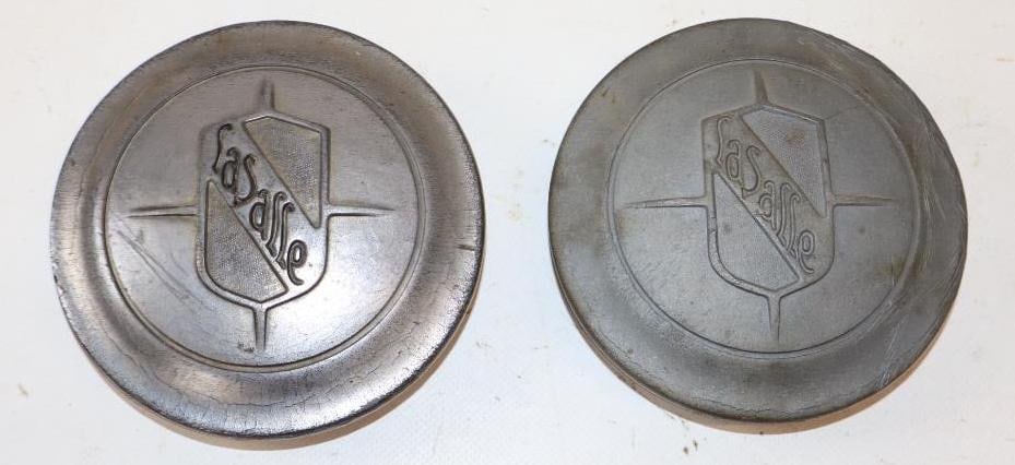 Group of 2 Cadillac La Salle Embossed Pot Metal Threaded Automobile Hubcaps: Both have cracks as seen in pictures. 4.25" x 4.25" x 1.5" each