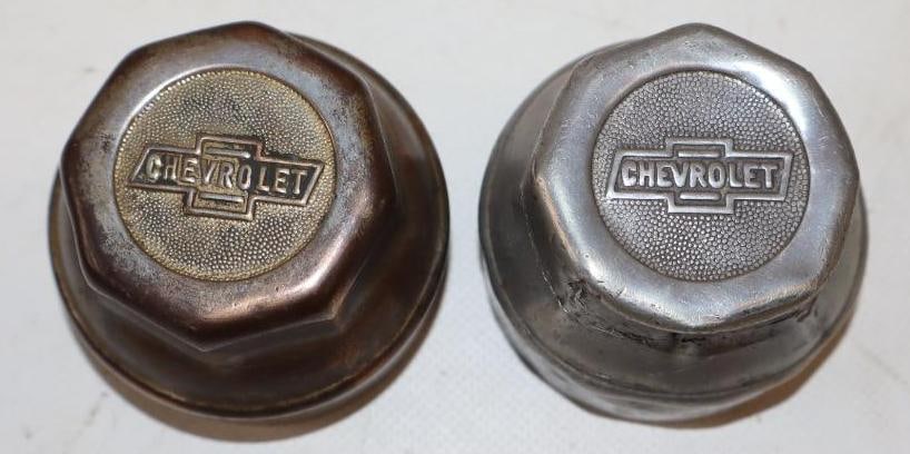 Group of 2 1920's Chevrolet Steel and Aluminum Embossed Threaded Automobile Hubcaps: 2.5" x 2.5" x 1.75" each