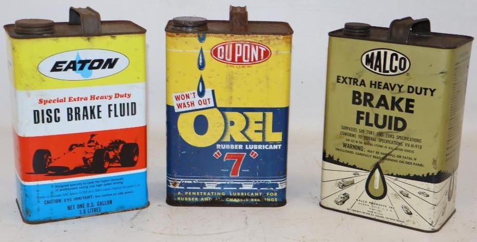 Group of 3 Du Pont Orel, Malco, and Eaton Brake Fluid One Gallon Cans with Car Graphics: All are empty. 128 oz each