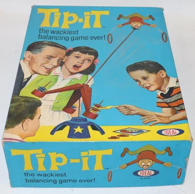 1965 Tip-It Family Board Game in Original Box: Game seems to be mostly complete with a portion only of the spinning wheel. 11" x 15" x 4"