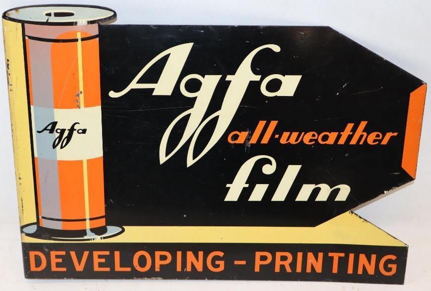 Agfa All Weather Film DST Die Cut Flange Sign: This flange has good color and gloss on both sides. There is some light surface wear and scratches throughout the field. 13" x 18". Graded 8.25 and 8.25.