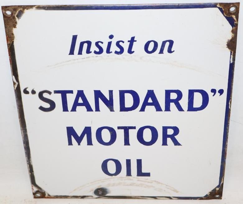 Insist on Standard Motor Oil SSP Porcelain Pump Sign: This sign shows some fading to the field as well as a couple areas of wear. It also has some chipping at the mounting holes and at the perimeter. 12" x 11.25". Graded 7.5.