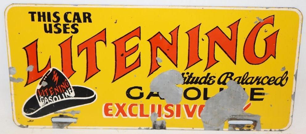 Litening Gasoline Yale Oil Company Sign Topper: This is a single sided painted galvanized metal sign topper. It has some areas of paint flaking in the field and near the bottom mounting holes. The remaining paint is stable and shows bright colors t