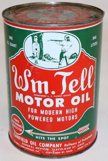 Wm. Tell Canfield Metal 1 Quart Motor Oil Can: The display side shows some light scratches with a minor spot of paint loss at the bottom edge. The reverse has a few more surface scratches and light wear on the bottom edge. Drained by two holes in 