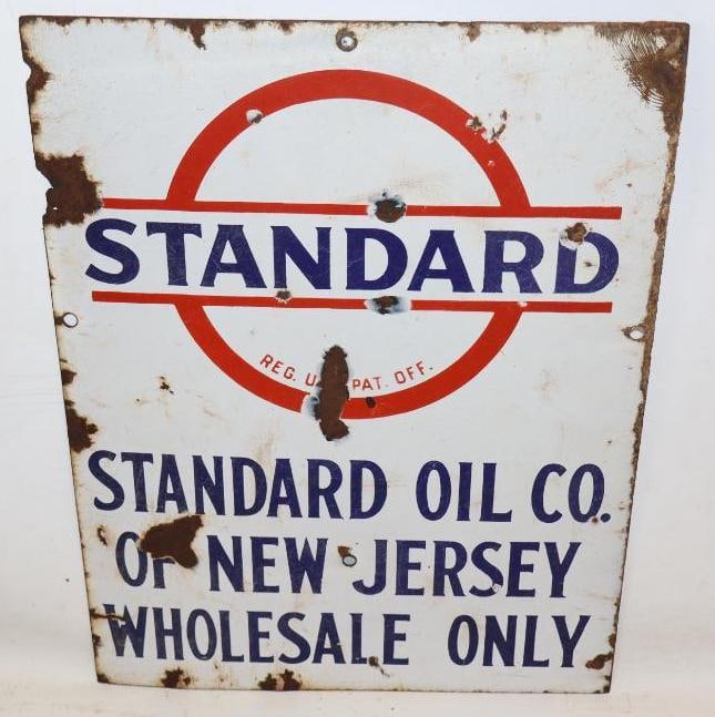 Standard Oil Co of NJ SSP Porcelain Wholesale Only Sign: This sign shows some chips throughout the field as well as heavy wear and chipping along the perimeter. There are also several areas of crazing in the field. The porcelain also is slightly faded with 