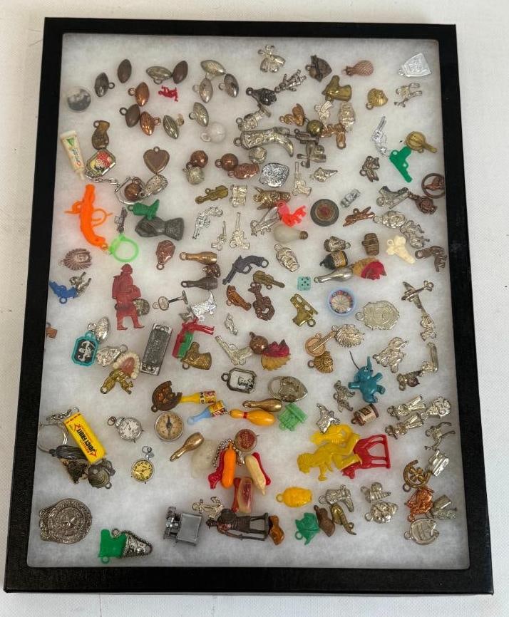 Group of over 200 Keychain and Bracelet Charms Displayed in Riker Case (1 of 4)