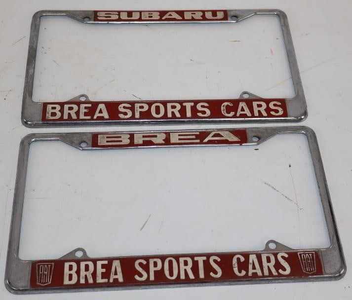 Group of 2 Brea Sports cars Subaru & Fiat Embossed Dealership License Plate Frames: 12" x 6.75" each