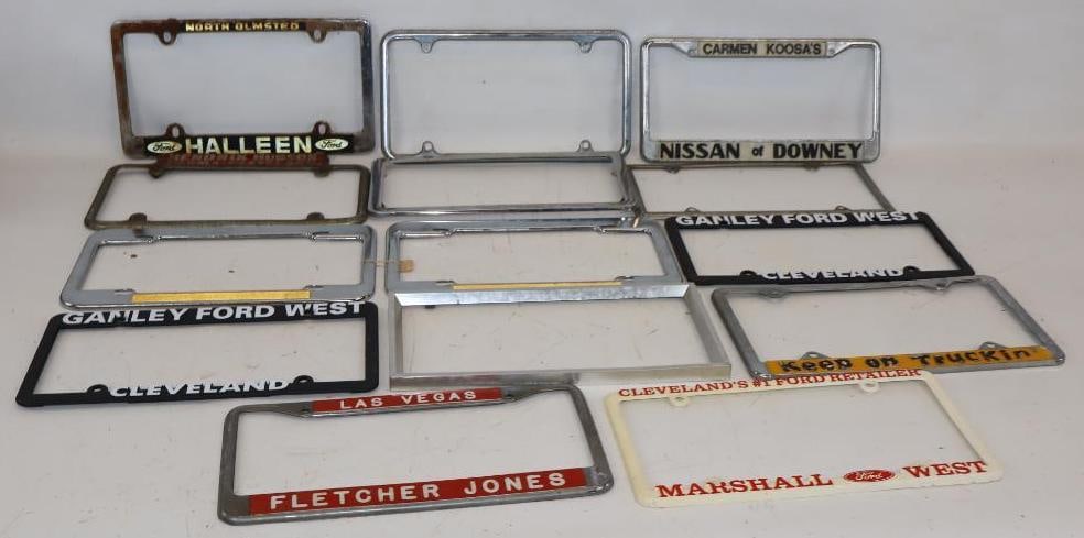 Group of 14 Metal & Plastic Car Dealership License Plate Frames: Largest is 7.5" x 12"