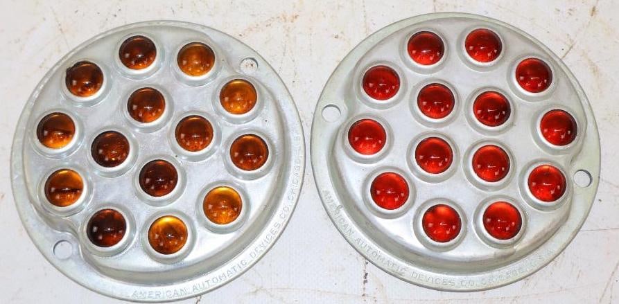 Group of 2 American Automatic Devices Red and Yellow Glass Reflectors: 4.5x4.5x.75 Each
