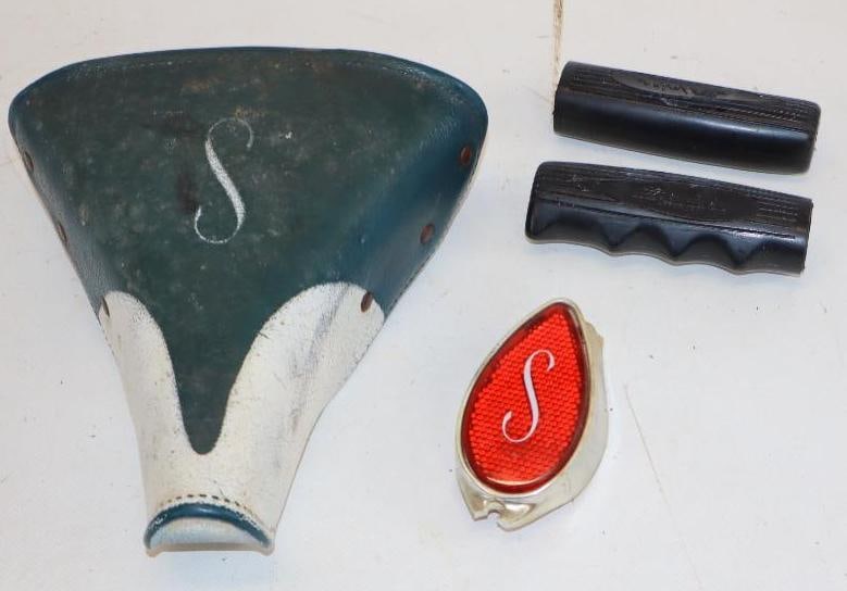 Group of 4 Schwinn Bike Seat, Handlebar Grips, and Reflector (1 of 4)