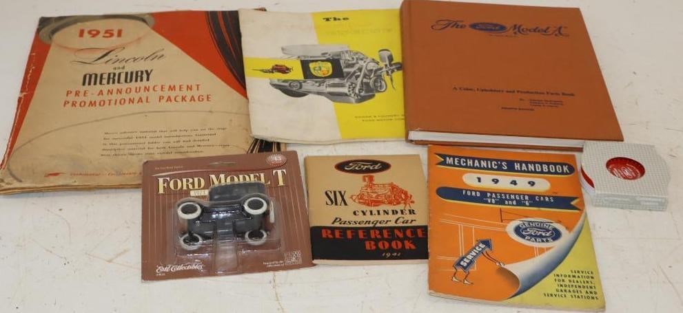 Group of 7 Ford Books, Manuals, Coasters, and Model T Ca4: Largest is 14" x 11"