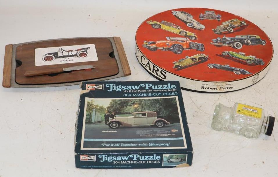 Group of 4 Early Automobile Puzzles, Serving Tray, and Car Shaped Bubblegum Container: Largest is 14" x 14" x 1.5"