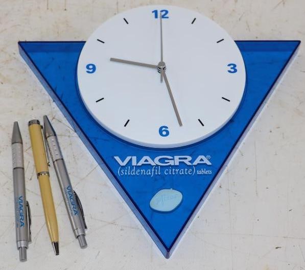 Group of 4 Viagra Advertising Pens & Clock: Largest is 10.5" x 10.5" x 1" clock is battery operated and untested