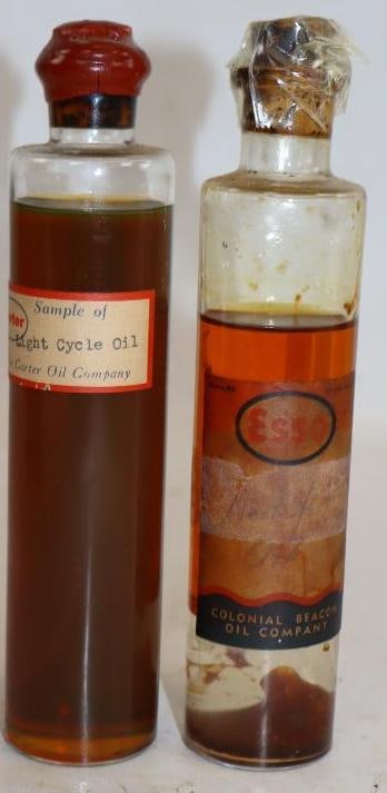 Group of 2 Colonial Beacon and Carter Oil Sample Bottles: 1.25" x 1.25" x 6.5" each, Colonial Beacon label is oil stained