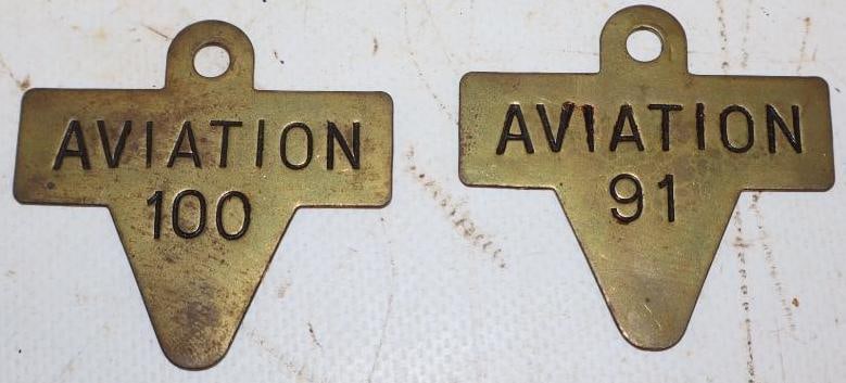Group of 2 Stanavo Aviation 91 and 100 Brass Gasoline Tags: 2" x 1.75" each