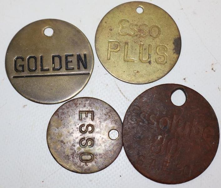 Group of 4 Esso Plus, Esso Golden, and Essolube Brass Fuel Tags (1 of 2)