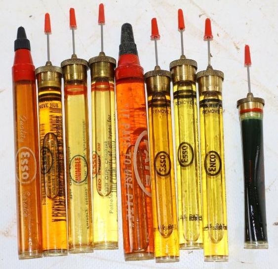 Group of 9 Esso, Enco and Pate Handy Oiler Pens: largest .5" x .5" x 5.5"