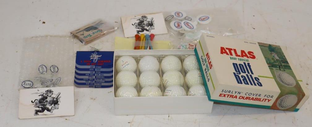 Group of 68 Atlas, Esso, and Enco Golf Balls, Ball Marker, Bottle Stoppers: Largest is 7" x 5.5" x 1.75"