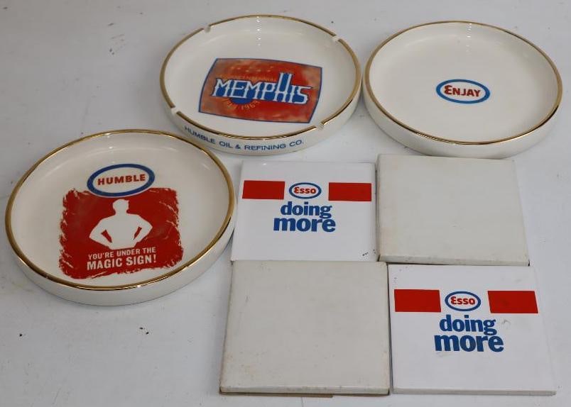 Group of 7 Humble, Esso, and Enjay Ceramic Advertising Ashtrays and Coasters: Largest is 7" x 7" x 1"