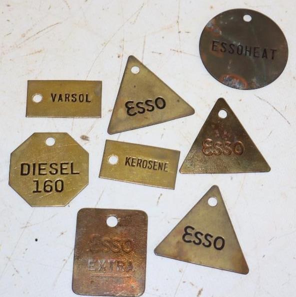 Group of 8 Esso Fuel & Oil Brass Tags: Largest is 2" x 2"