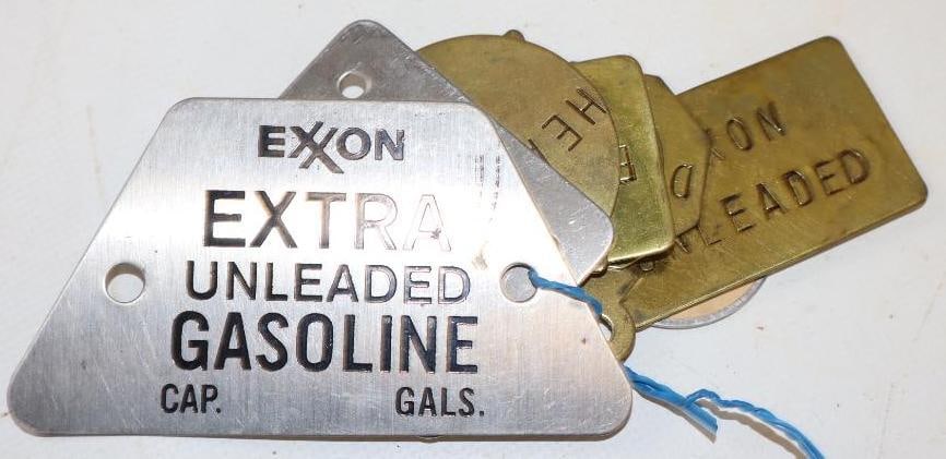 Group of 9 Exxon Gas & Oil Brass & Metal Tags: Largest is 4" x 2.25"