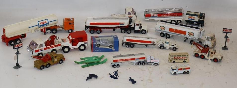 Group of 23 Esso & Exxon Toy Tanker Trucks & Accessories: Largest is 12" x 2.5" x 3"