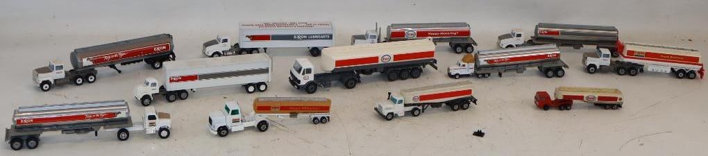 Group of 11 Esso & Exxon Diecast in Plastic Toy Semi Trucks: Largest is 11.5" x 2.5" x 2"