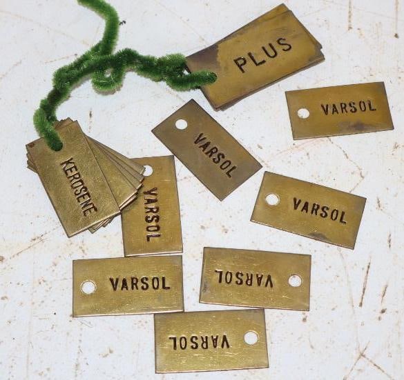 Group of 18 Exxon Plus Kerosene and Varsol Brass Gasoline Tags: Largest is 2x1
