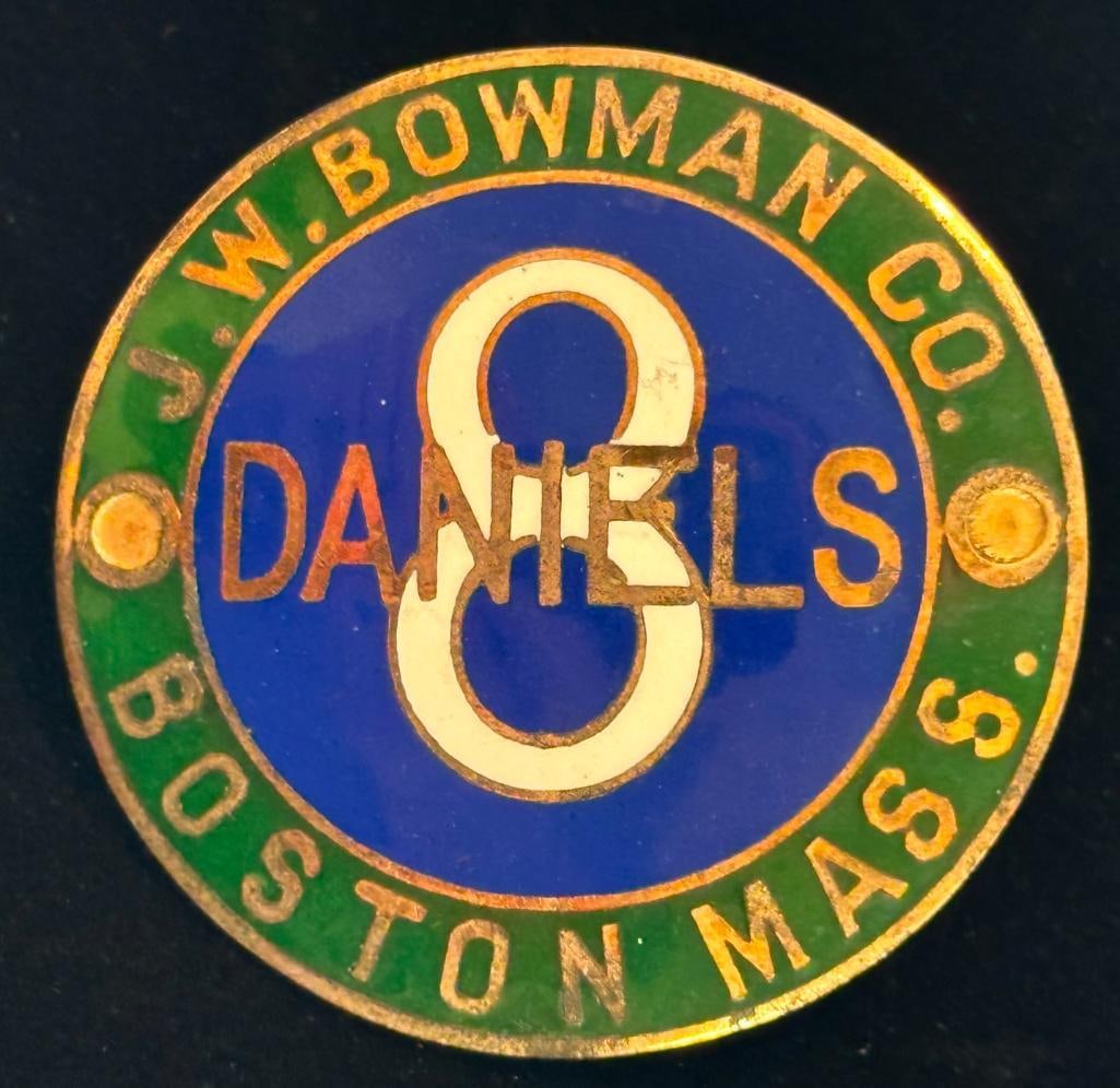 Daniels 8 Emblem: c1915 - 1924 Daniels 8 Bowman dealer emblem. It is rated very rare and measures approximately 2.5" in diameter.