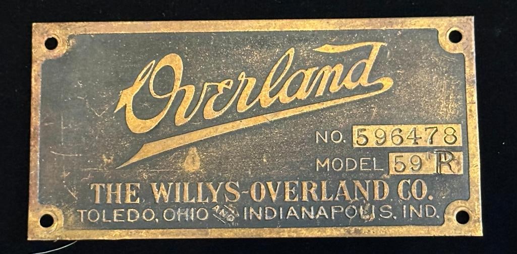 Overland Serial Number Plate Tag: Overland Serial Number Plate Tag. It measures approximatley 3.625" wide by 1.9" high