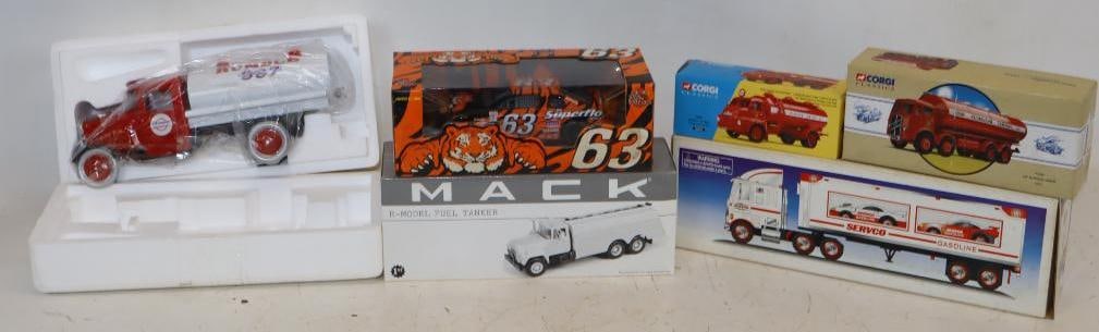 Group of 6 Humble, Exxon, & Servco Advertising Toy Trucks in Original Boxes: Largest is 13" x 6.5" x 5"