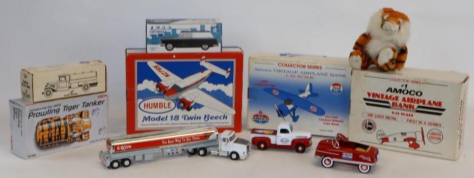 Group of 8 Amoco, Exxon, and Esso Gas Station Toy Trucks and Cars: largest 12" x 9" x 4.5", 3 are missing boxes