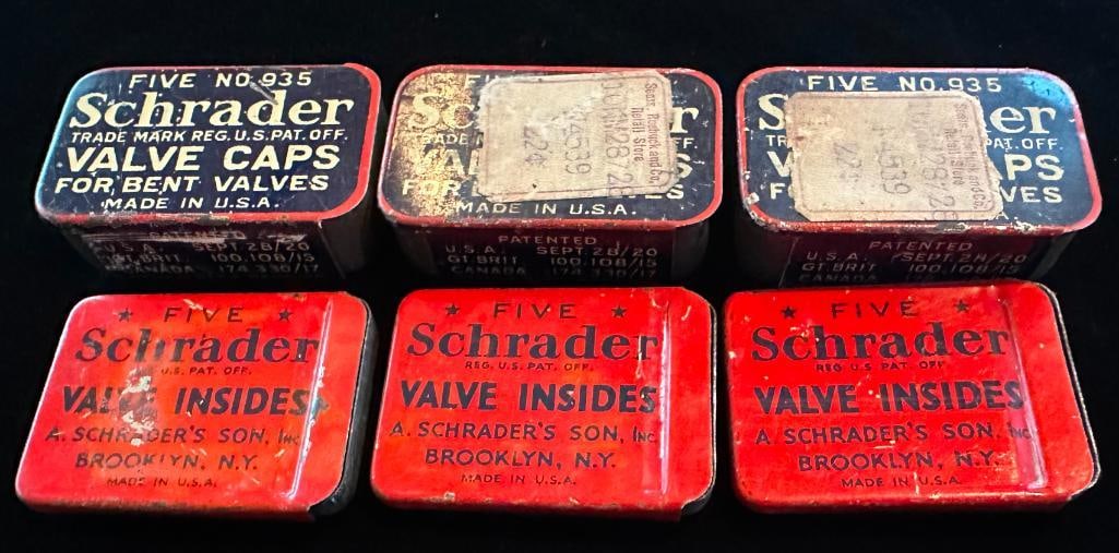Schrader Inner Tube Valve Caps And Cores: Schrader Inner Tube Valve Caps and Cores. Quantity 6. Each case measures approximately 1.5" wide by 1" high. One of the red, white and blue cases is empty.